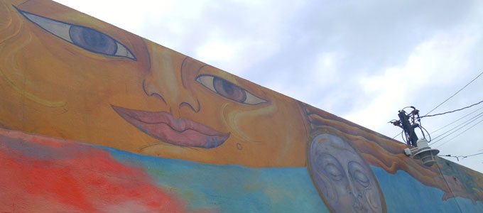 Sun and Moon, top of a wall mural, the Haight, San Francisco